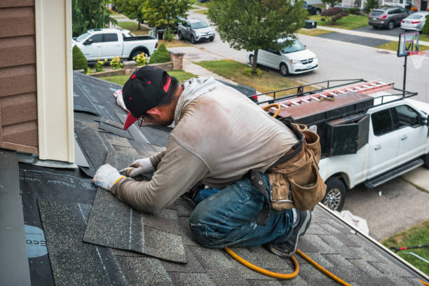 Professional Roofing technician working in Aurora, TX